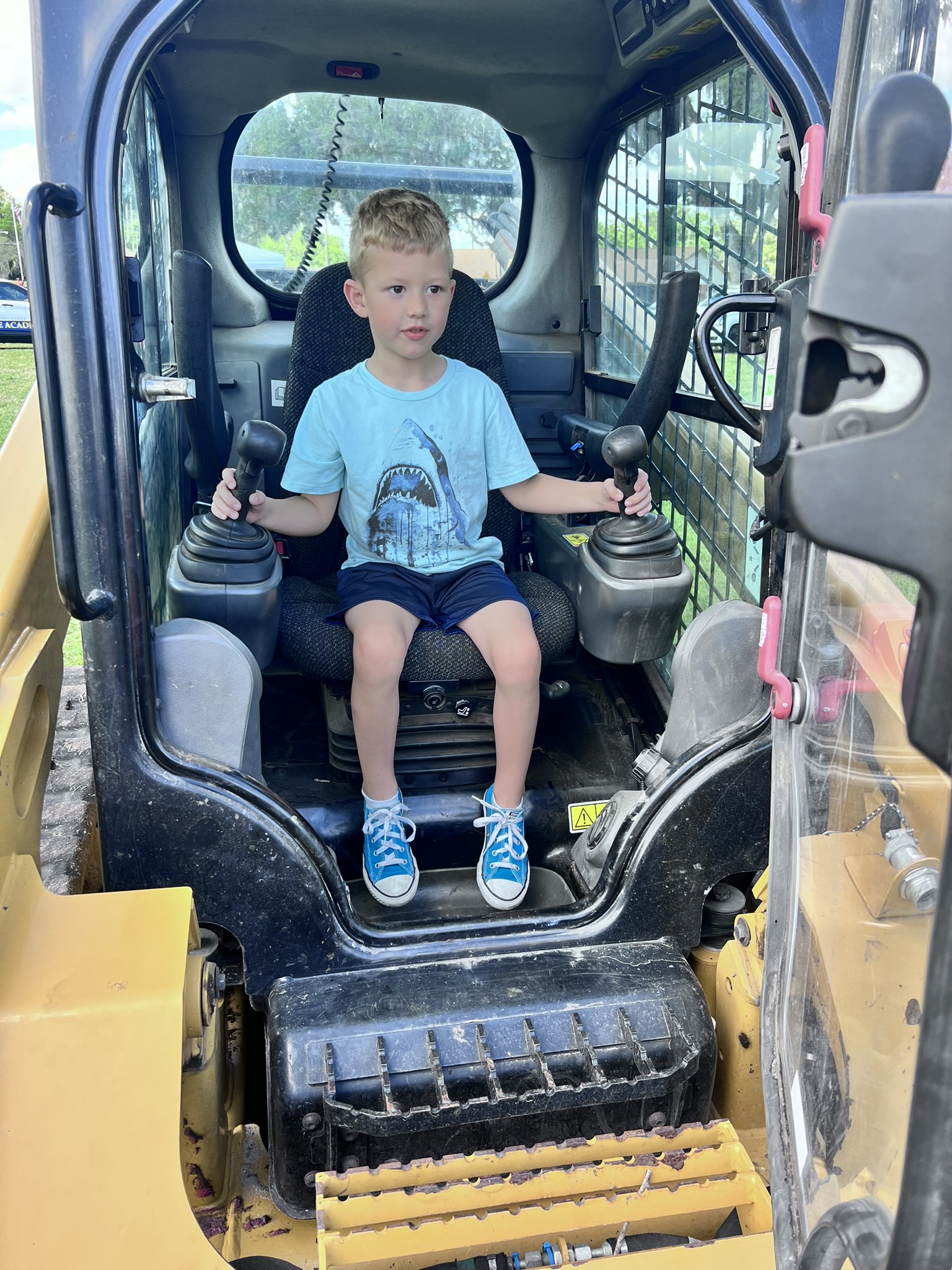 JD in CAT skid steer