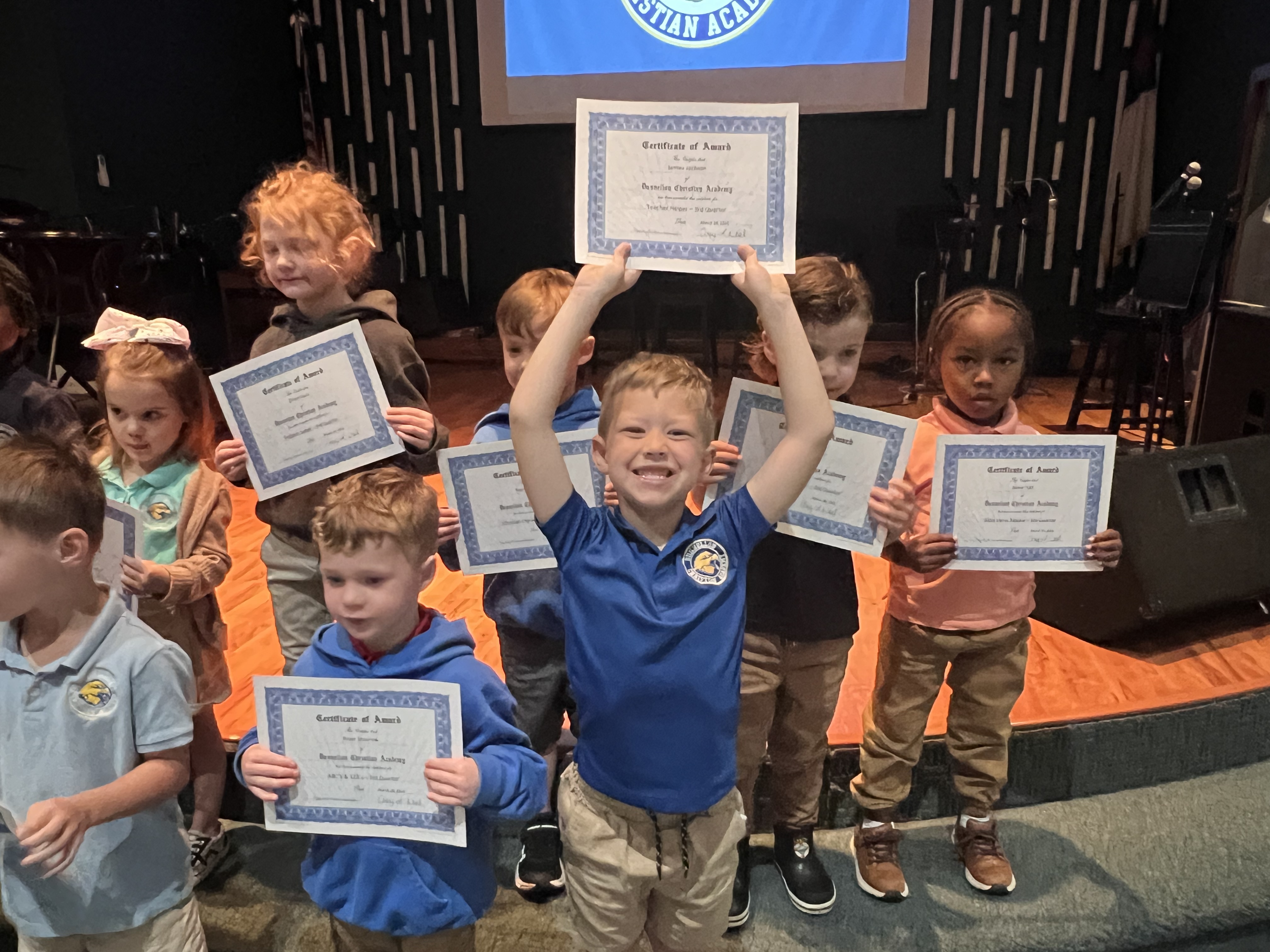 JD holding certificate triumphantly